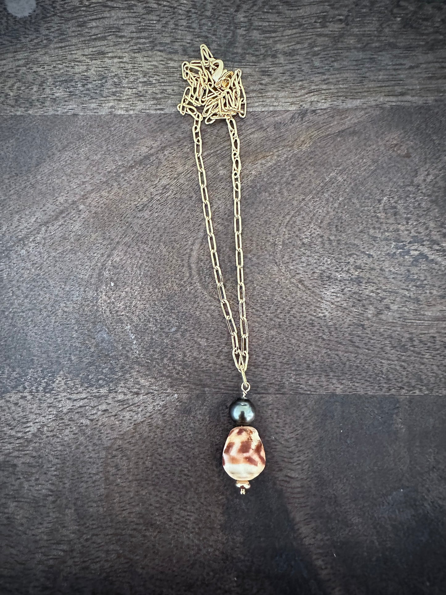 Pacific Fusion: The Hawaiian Hebrew Cone Shell and Tahitian Pearl Alchemy Necklace