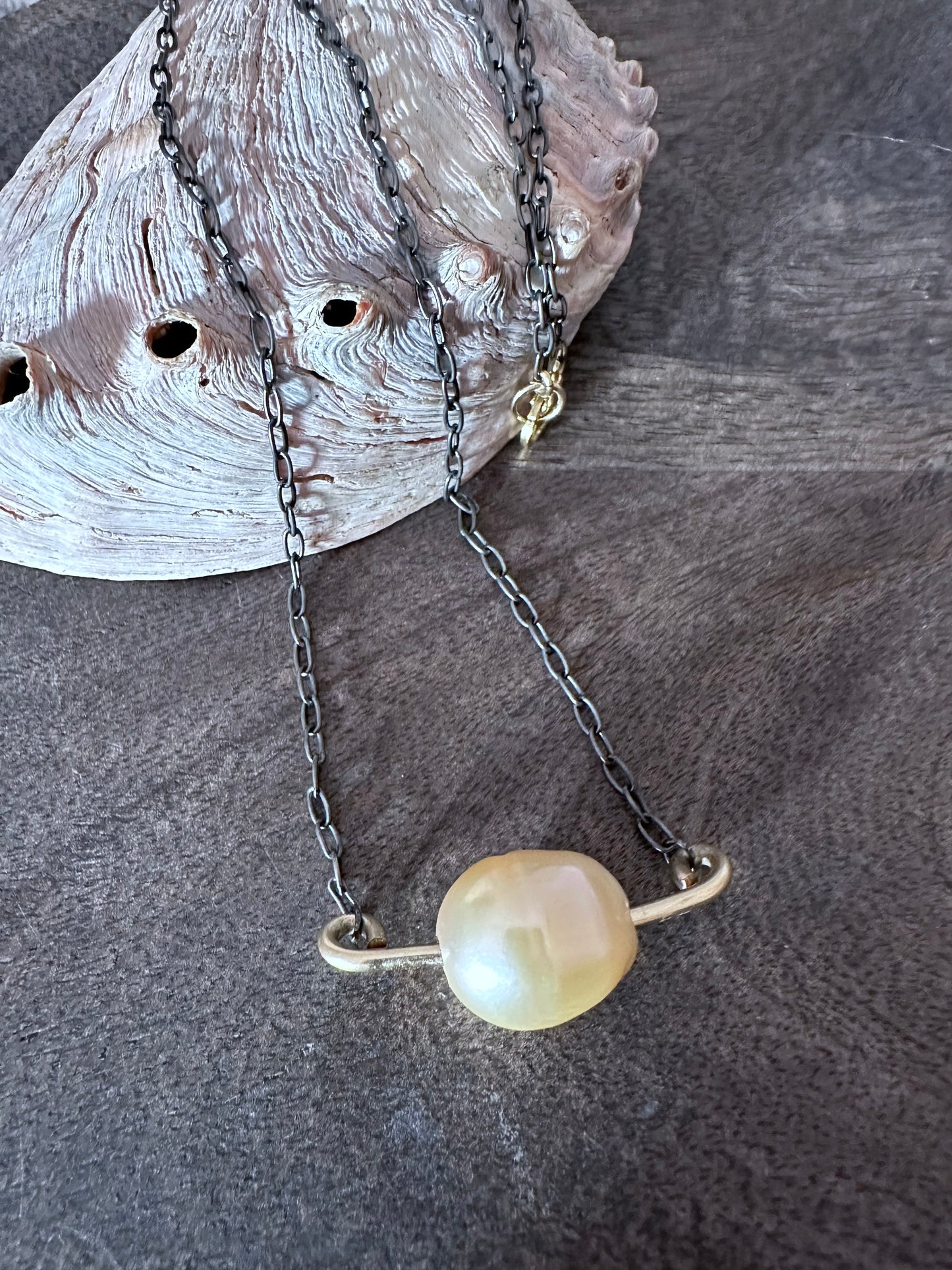 Orions Belt: Tahitian Or Baroque Fireball Pearl on a Gold Bar Necklace