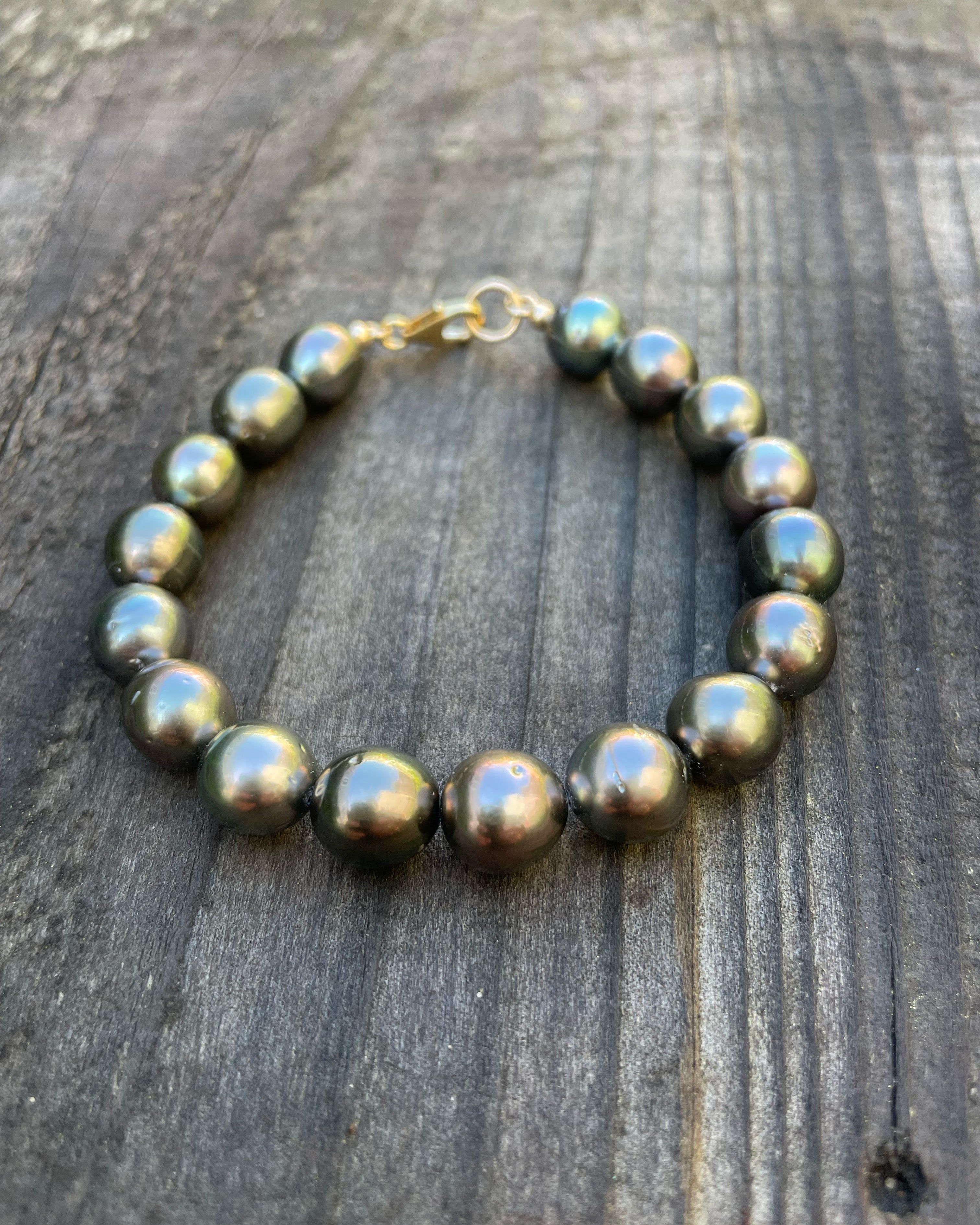 Tahitian pearl beacelet of 11 mm baroque peaels strung with a gold filled clasp